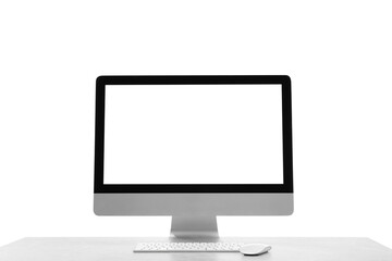 New computer with blank monitor screen, keyboard and mouse on white background