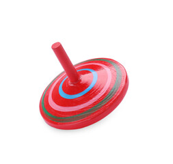 One bright spinning top isolated on white. Toy whirligig