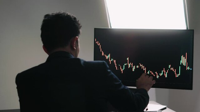 Businessman stressful anxiety losing trading loss on market foreign exchange market, digital crypto currency exchange market, stock market using computer laptop device.