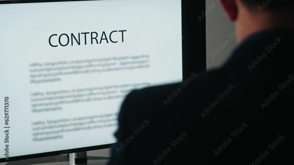 Poster businessman reading contract documents on computer screen in office