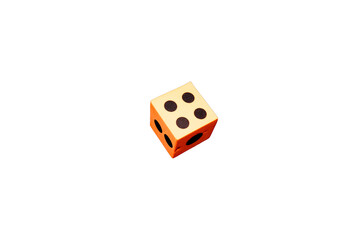 An orange foam dice on a white background
