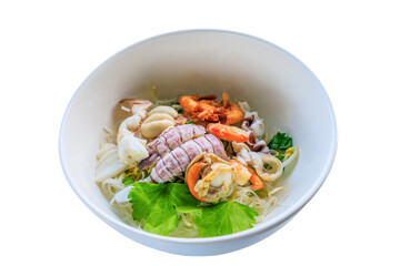Spicy seafood noodles bowl in thai style.