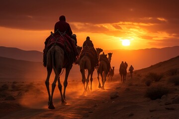 An inspiring image of a camel caravan silhouetted against the fiery hues of sunset, traversing the undulating dunes of the Sahara, a timeless journey.
