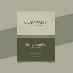 Fototapeta premium Printable Luxury Business Card Template Decorated with foliage and green Cream Color background