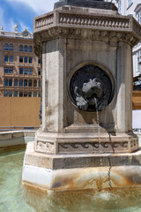 Vienna, Austria - June 13, 2023: Inserts in the pedestal of Joseph Fountain on Green Street in the center of Vienna