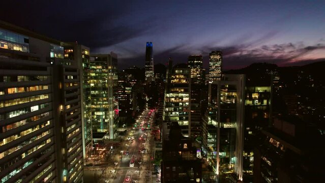 Aerial Drone Above Santiago Chile Las Condes Avenue at Night Skyscraper Streets High Tower Buildings, Sunset Skyline at Latin American Metropolis