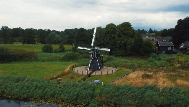 Keppel water mill: aerial view travalling in to the beautiful mill located in the netherlands and on a sunny day.