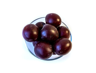 photo of plum on a plate, isolate
