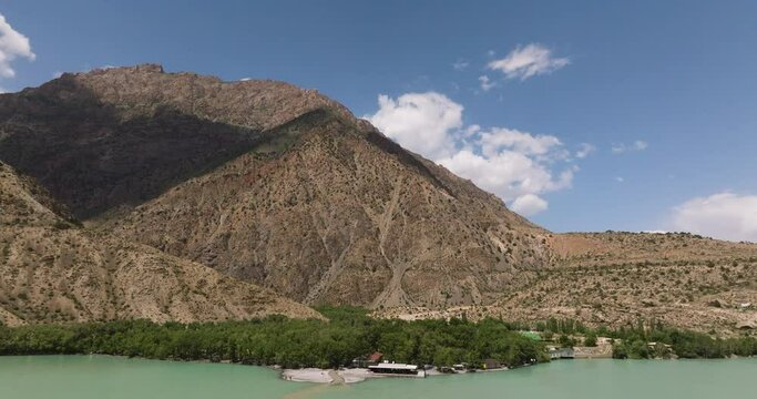 Mountain Glacial Lake Of Iskanderkul In Tajikistan's Sughd Province, Central Asia. Aerial Drone Shot
