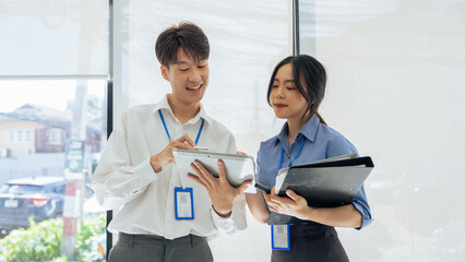 Employees discuss brainstorming planning business strategy together in the office