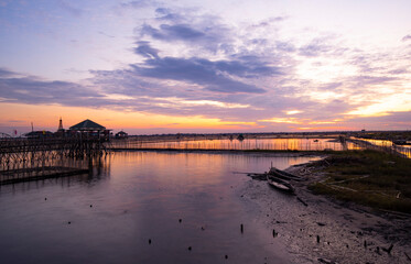 Obraz premium Sunrise in the Tam Giang lagoon, Hue city, Thua Thien Hue province, Vietnam.