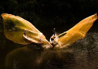 Fishing with nets on Nhu Y river, Hue city, Vietnam