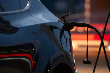 Electric vehicle charging at night © Janne