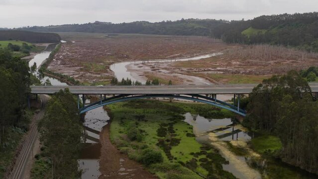 Aerial Panoramic Drone Above Highway A8 Traffic, Rubin Marsh Cantabria Landscape Natural Flooded Land between Rivers, San Vicente de la Barquera