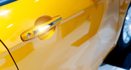 Detail of luxury yellow car