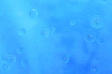 Abstract blue liquid bubble texture background