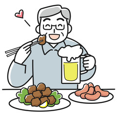 笑顔でから揚げを食べビールを飲むシニア男性