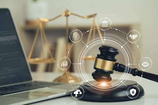 AI ethics and AI Law concept. Judicial gavel and laptop with legal astute icons on the table. artificial intelligence law and online technology of legal law regulations. AI technology group control.
