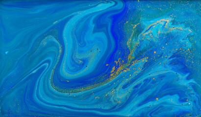 Liquid Flow of Gold and Blue Paint Pattern
