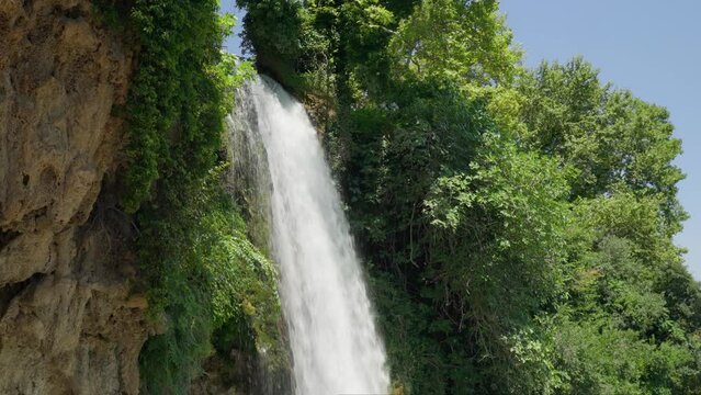Waterfall low angle shot summer sunny day forest national park cliff river