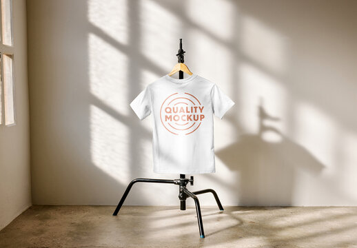 Mockup of t-shirt on clothes stand, customizable color