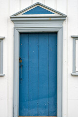 Obraz na płótnie Canvas Blue door of a historic house on a sod farm on iceland in summer