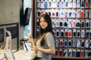 Side view of woman using smart phone in store