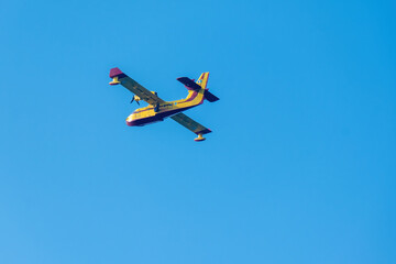 old style airplane on blue sky