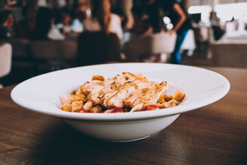 Chicken salad in stylish and luxurious restaurant