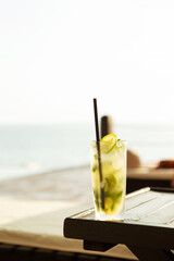 Resort swimming pool, a glass of cool limeade