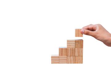 woman hand holding wooden blocks. Isolated on white background. Business ideas for successful growth process.PNG © Sumeth