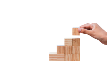 woman hand holding wooden blocks. Isolated on white background. Business ideas for successful growth process.PNG