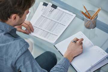 legal expert professional lawyer reading and checking financial documents or insurance contract