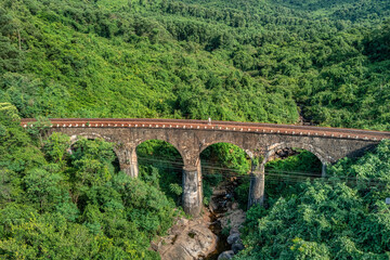 Fototapeta na wymiar Aerial view of train and railway on Hai Van pass, Thua Thien Hue area, Vietnam