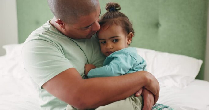 Hug, kiss and a father with a child in the bedroom for support, love and quality time. Family, home and a young dad with care for a girl kid on a bed for security, together and in the morning