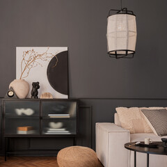 Creative composition of living room interior with mock up poster frame, glass sideboard, vase with...