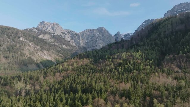 Sunny Day in Upper Austria. Aerial View of Green Forest and Mountain Hills on Spring Season, Drone Shot