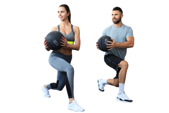 Beautiful young sports couple is working out with medicine ball on a transparent background
