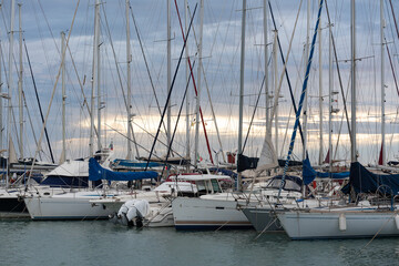 Lido di Ostia, Rome, Italy - September 2022: Yachts and sailboats moored in the tourist port of...