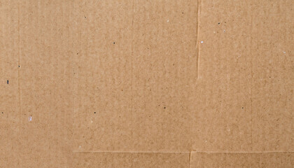 Cardboard sheet texture background, detail of recycle brown paper box pattern.