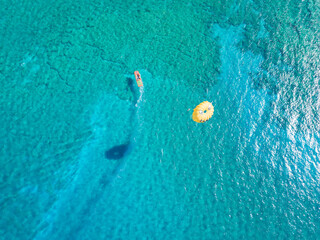 Cyprus, Protaras city, a boat pulling a balloon with a smile on the sea © Marcin