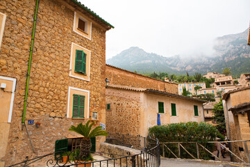 View of a medieval street in the Old Town of the picturesque Spanish-style village Fornalutx, Majorca or Mallorca island
