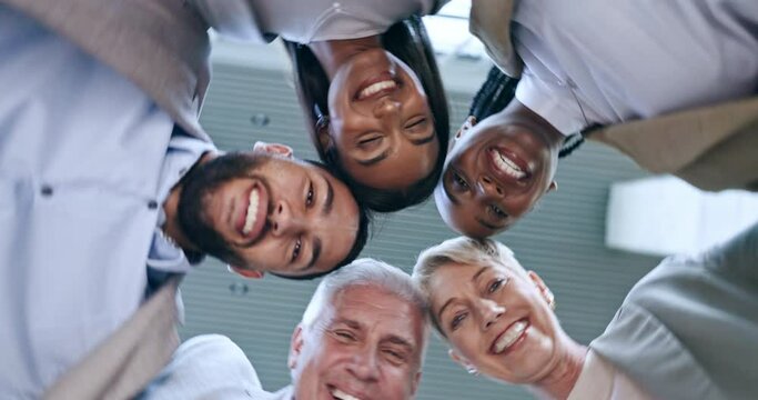 Faces, motivation or happy business people in huddle for support on mission, collaboration or partnership. Diversity, low angle portrait or colleagues in meeting with unity, smile or vision together