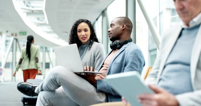 Business people, talking and working in airport for travel, trip or flight departure from international terminal lounge or lobby. African, businessman on computer and woman in work conversation