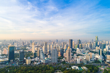 Fototapeta na wymiar Aerial view Office building with Lumpini Park downtown Financial district center in Sathorn