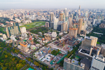 Fototapeta na wymiar Aerial view Office building with Lumpini Park downtown Financial district center in Sathorn