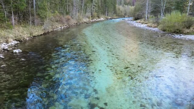 Aerial view of the Salza River with a mountain in the background on a fall day, Wildalpen, Styria, Austria.