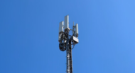5g tower mast. Telecommunication tower of 4G and 5G cellular. Macro Base Station. 5G radio network telecommunication equipment with radio modules