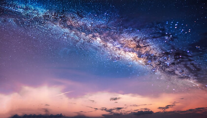 starry night blue sky on pink sunset milky way dramatic clouds galaxy cosmic space weather background