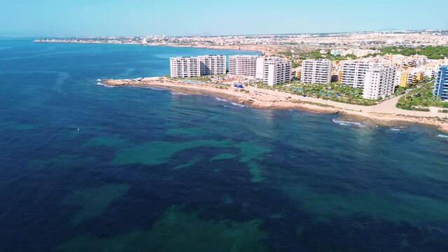 Punta Prima Beach with stunning city views, Alicante, Spain